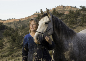 Carol Walker and her mustang companion, Mica.